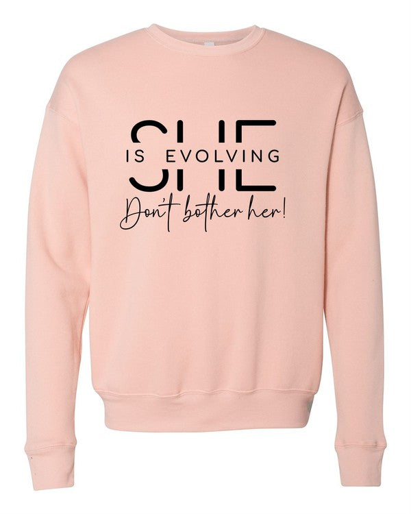 She is Evolving Bella Premium Sweatshirt