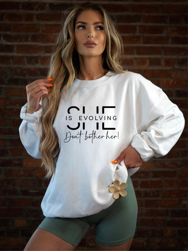 She is Evolving Bella Premium Sweatshirt