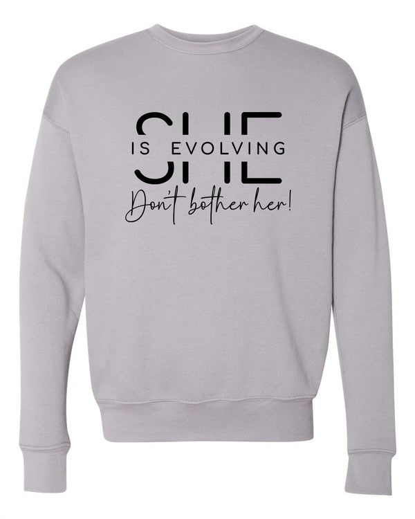 She is Evolving Bella Premium Sweatshirt