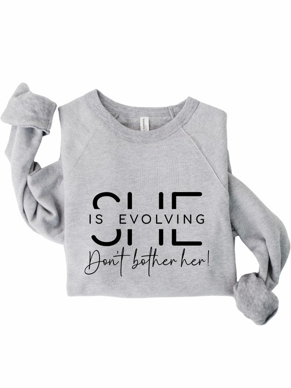 She is Evolving Bella Premium Sweatshirt